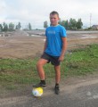 Юный футболист Андрей Черноусов с нетерпением ждет открытия нового стадиона.